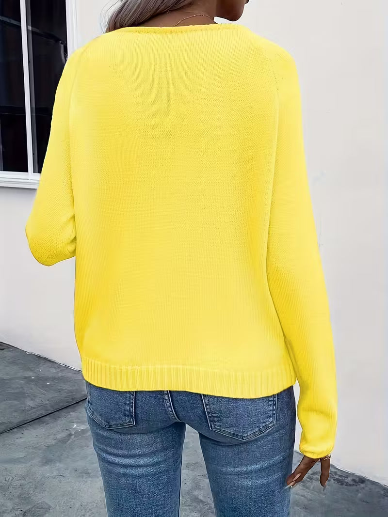 Maglione primaverile con dettagli floreali