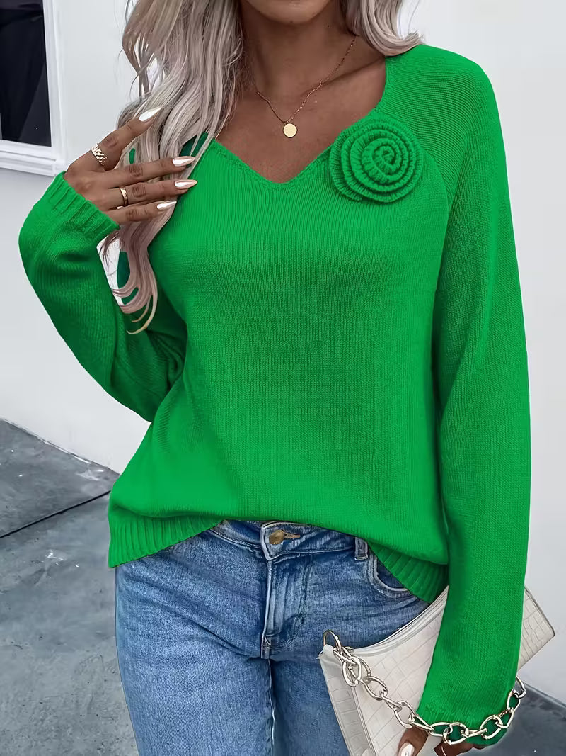 Maglione primaverile con dettagli floreali